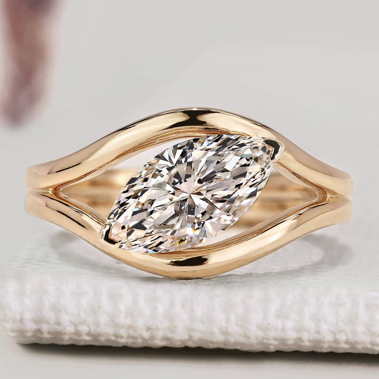 Marquise diamond engagement ring with solitaire style
