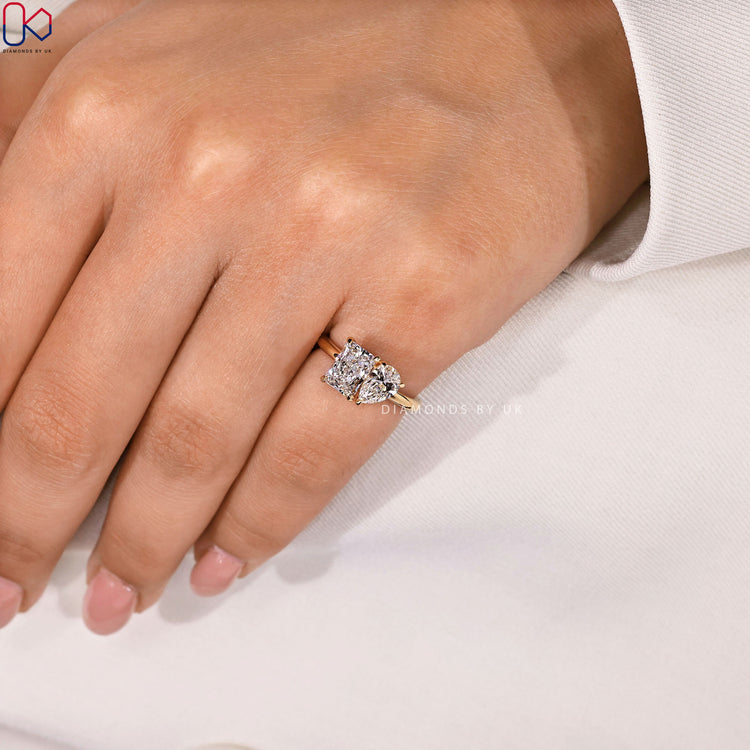 IGI Certified pear and radiant diamond ring.