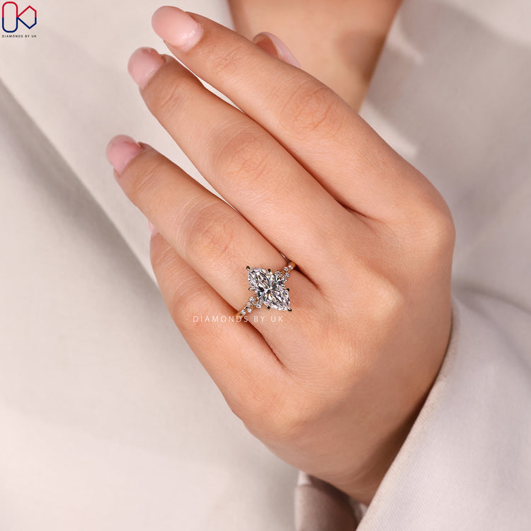 Marquise cut ring with six claw prong setting.