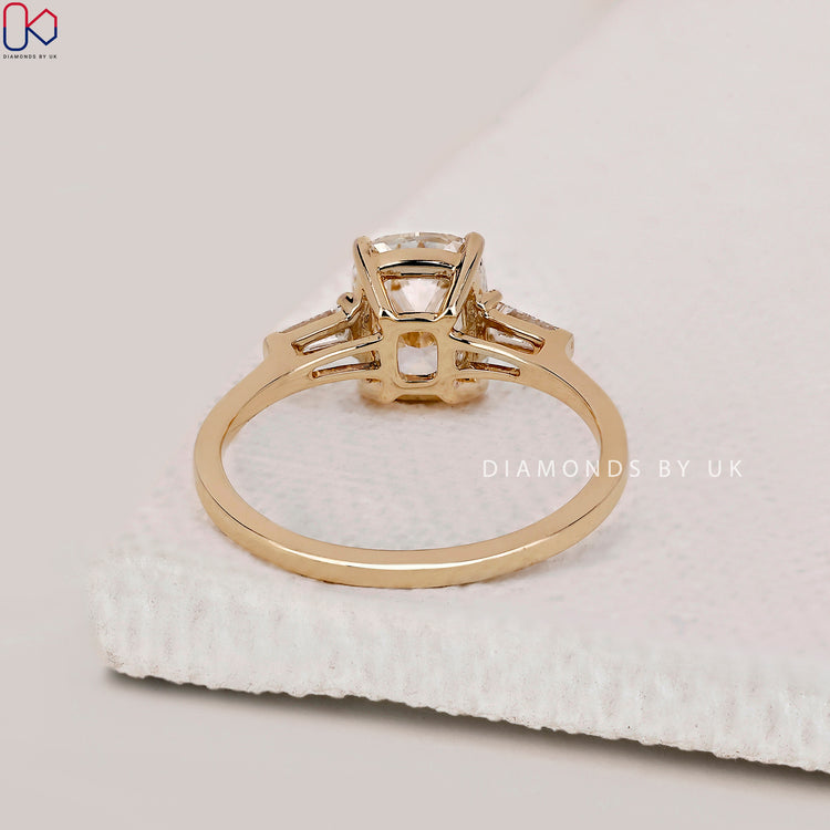 Handmade Jewelry with a tapered baguette diamond setting.
