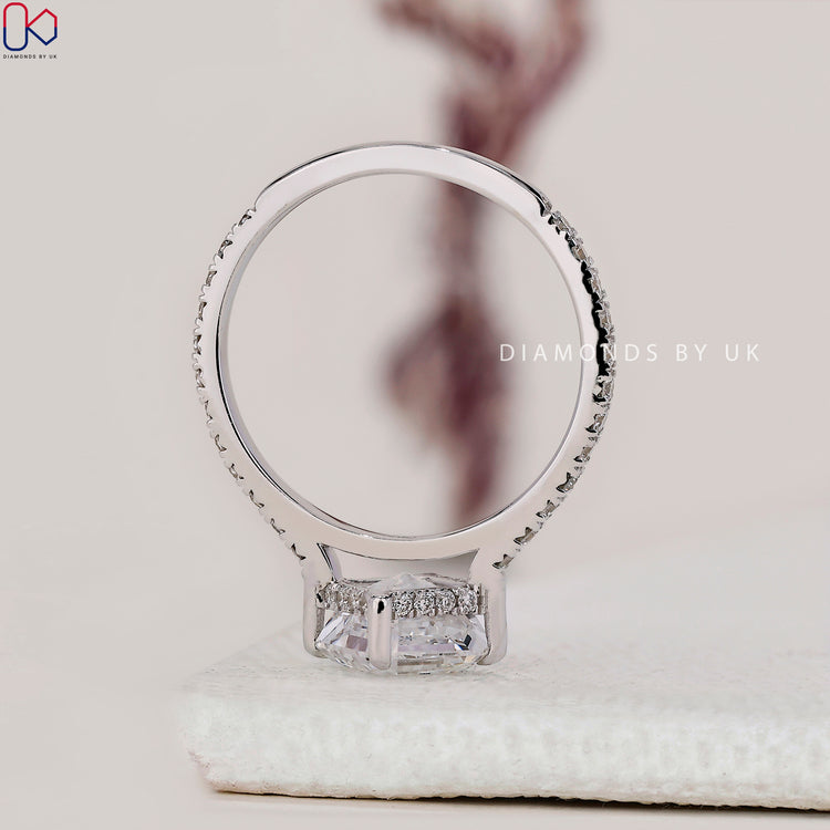 Gorgeous Diamondsbyuk engagement ring crafted with pave setting ring accents.
