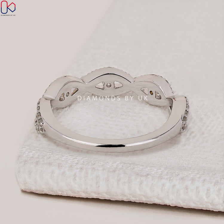 Evil eye half eternity band with round lab grown diamond.
