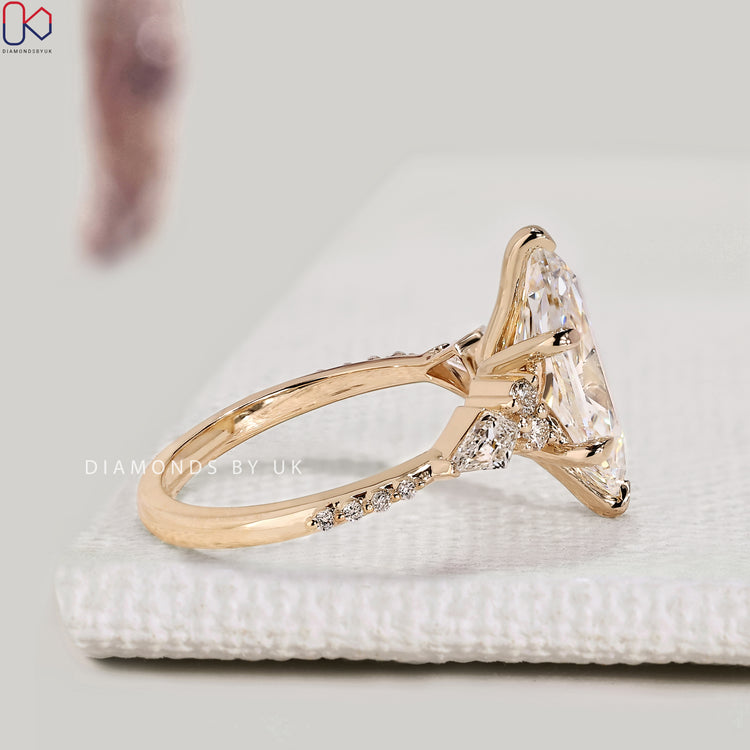 Lab grown Dutch marquise diamond ring with tapered shank.  
