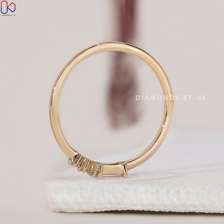 Prong set wedding band showcasing a secure and elegant setting for each stone
