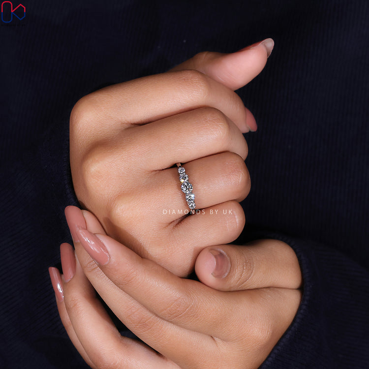 Lab grown round diamond band with five stone style.