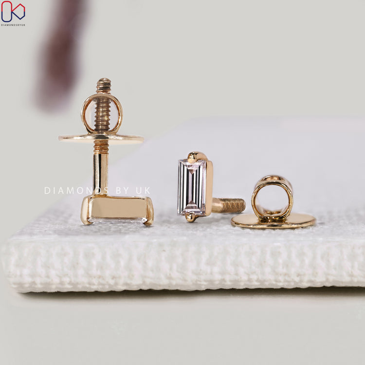 Handmade baguette cut diamond earrings.