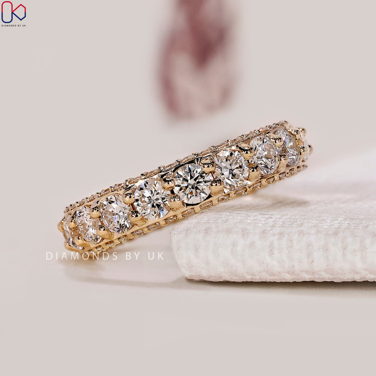 Round cut diamond band in a full eternity style setting.