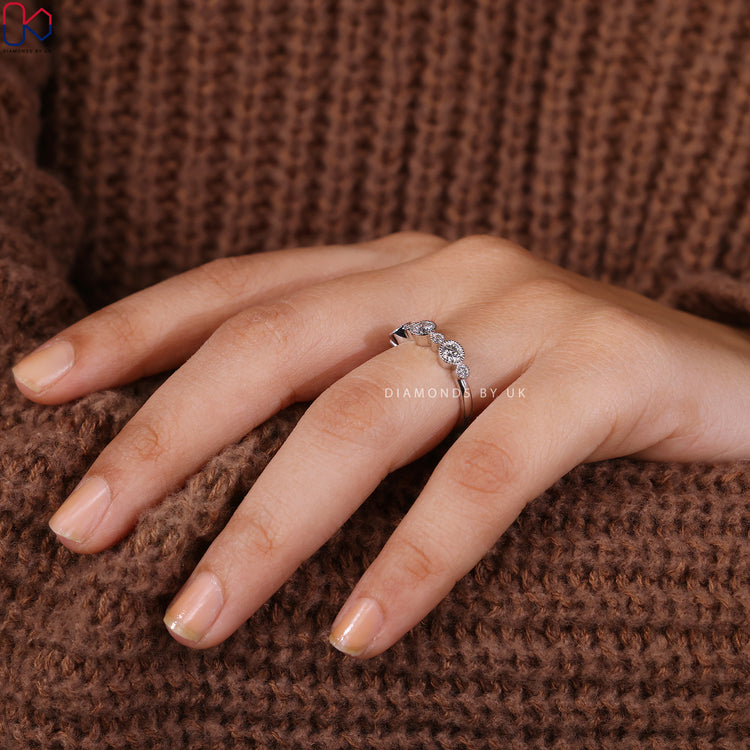 Diamondsbyuk half eternity band with round lab grown gems.
