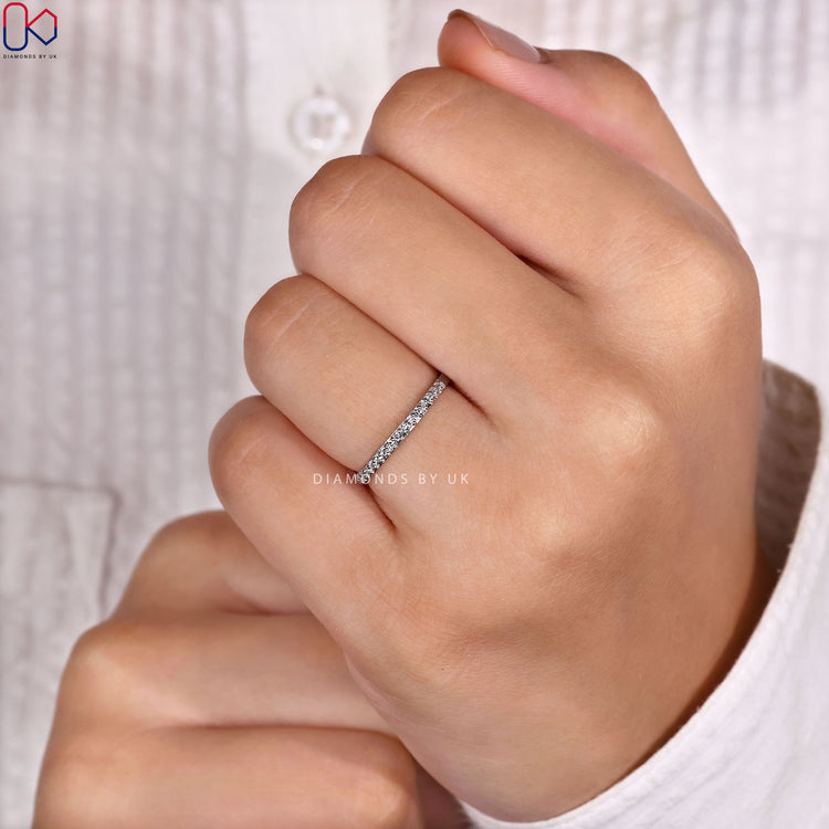 Diamondsbyuk handmade semi eternity wedding band.