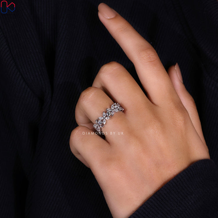 Handmade lab grown diamond wedding band with floral style.