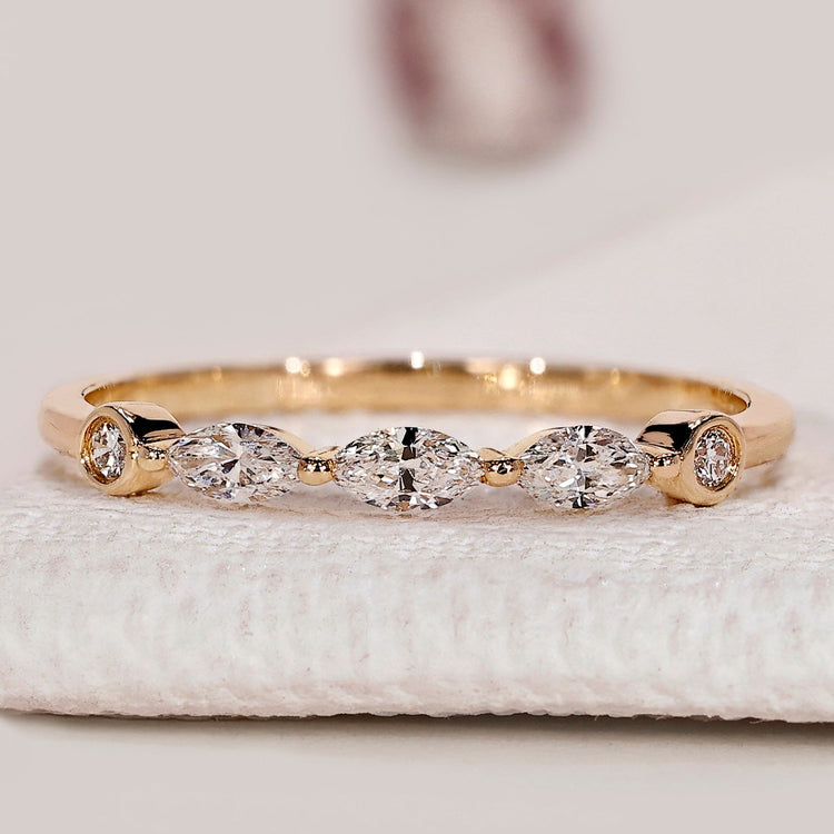 Marquise And Round Diamond Band in Shared Prong Style