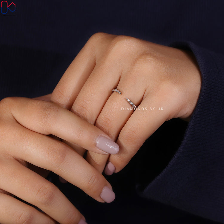 Diamondsbyuk handmade open gap wedding band with diamonds.
