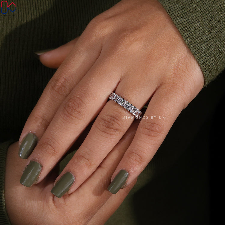 Half eternity lab grown emerald cut diamond band.
