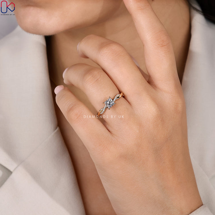 Twisted pavé princess cut diamond ring style.

