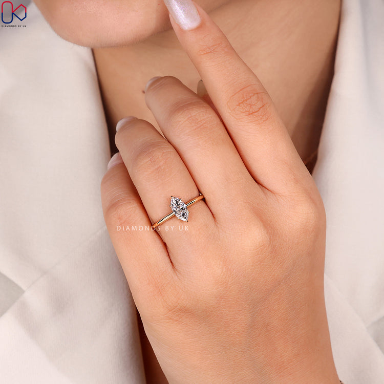 IGI Certified marquise cut solitaire ring style.