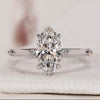 Handmade marquise diamond ring with distance pavé style.