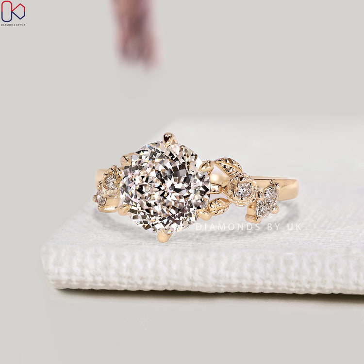 Nature inspired ring with five stone style setting
