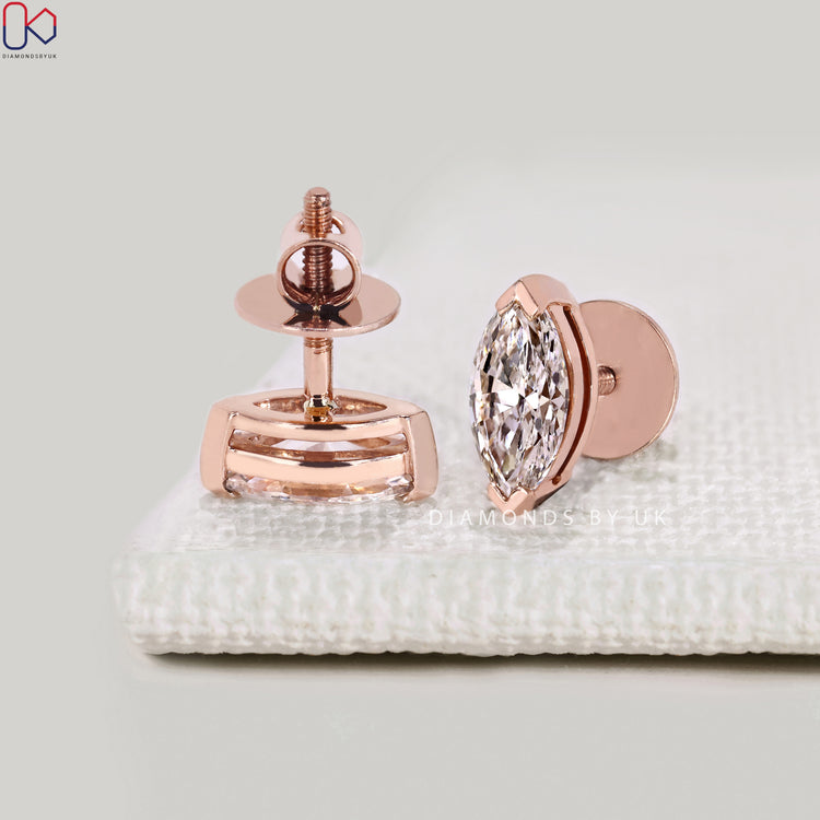 Lab grown diamond earrings with V prong setting.
