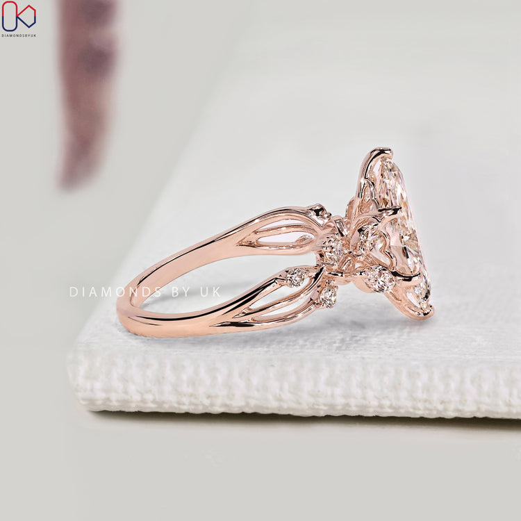 Nature inspired diamond ring with twisted shank design.
