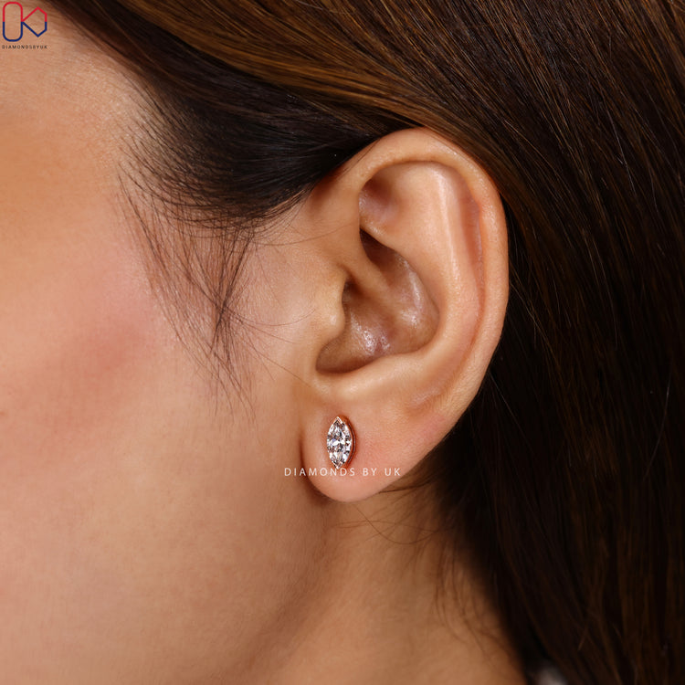 Handmade marquise stud earrings with V prongs.