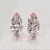 Marquise diamond stud earrings with V prong setting.