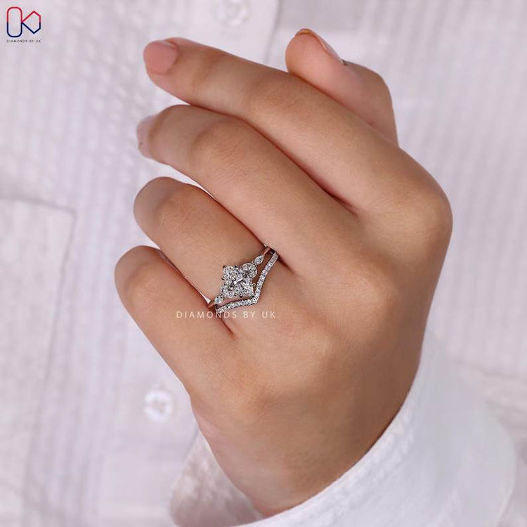Lab grown marquise ring with knife edge shank.