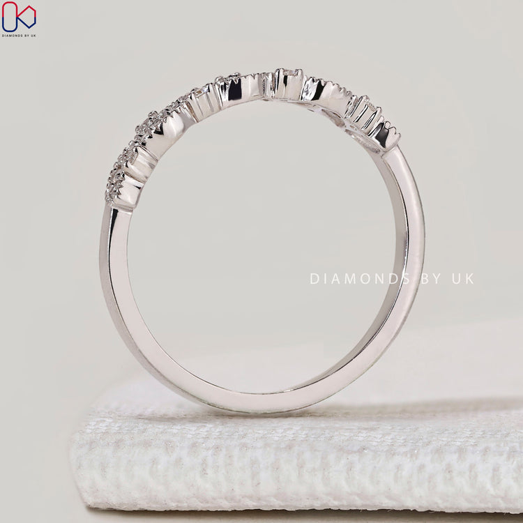 Round diamond band with milgrain and marquise outline.