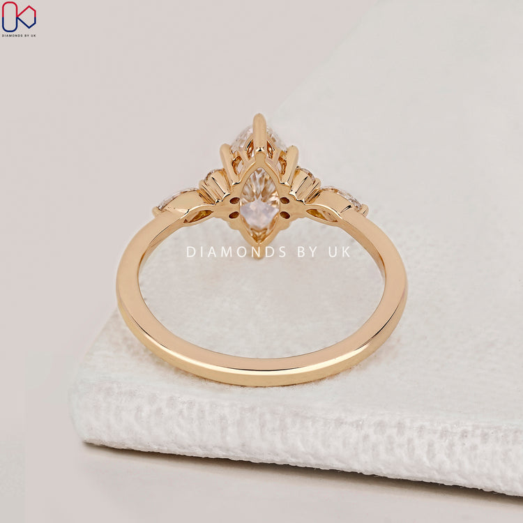 IGI Certified marquise cut seven stone ring.