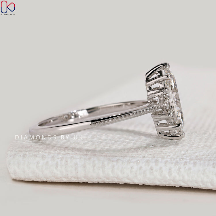 Handmade marquise ring with tapered shank design.
