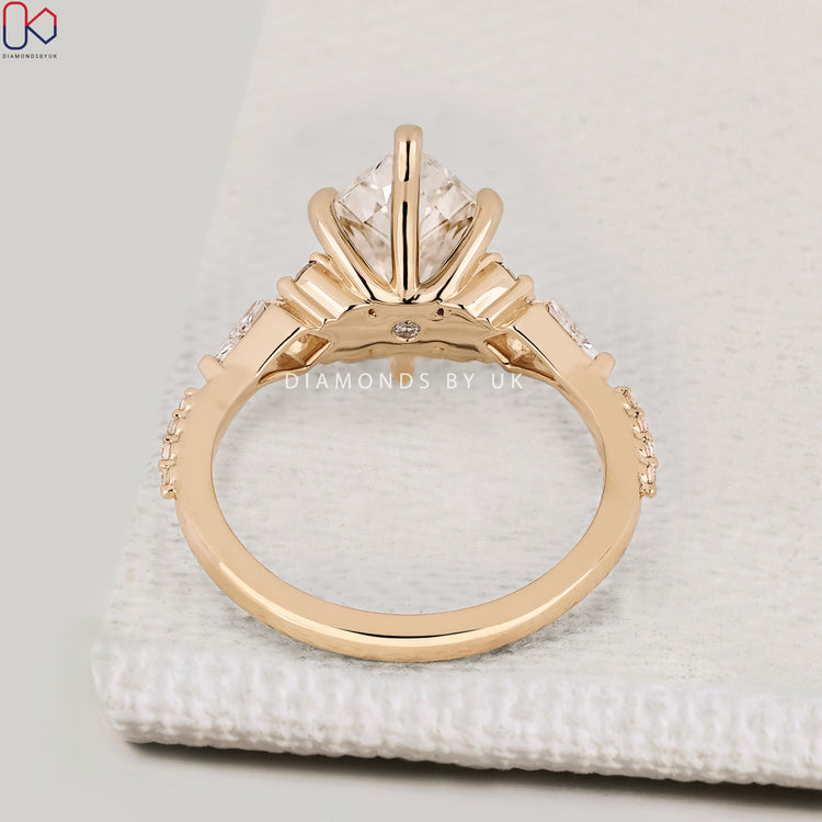 Handmade Dutch marquise ring with six claw prong setting.  
