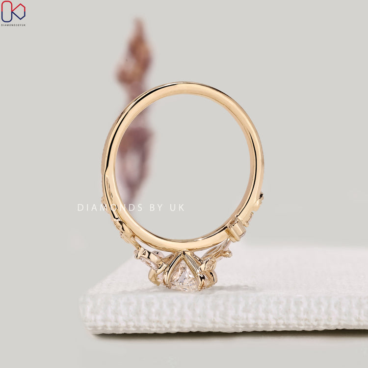 IGI certified marquise diamond ring with leaf prongs.
