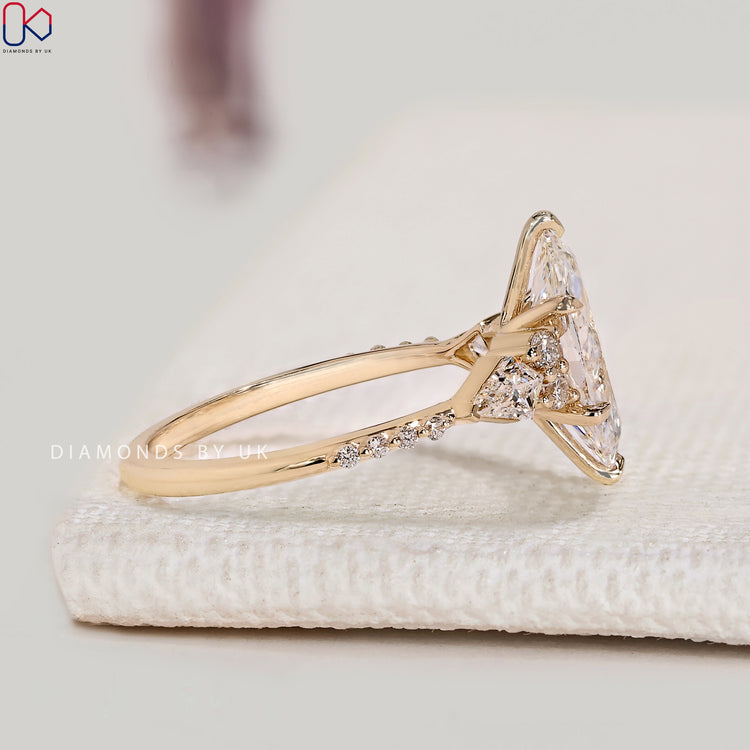 Lab grown marquise diamond ring with tapered shank.