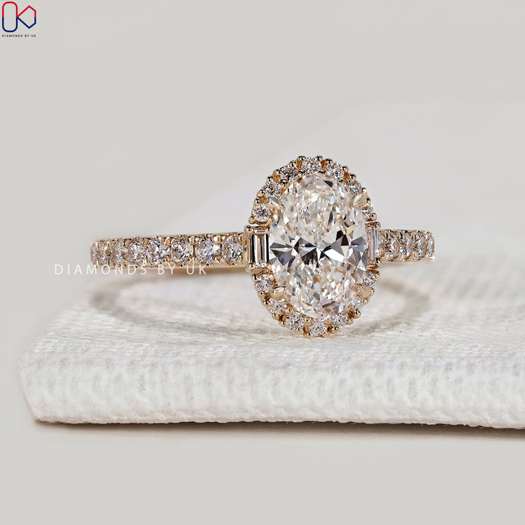 Oval lab grown diamond ring with pavé setting.
