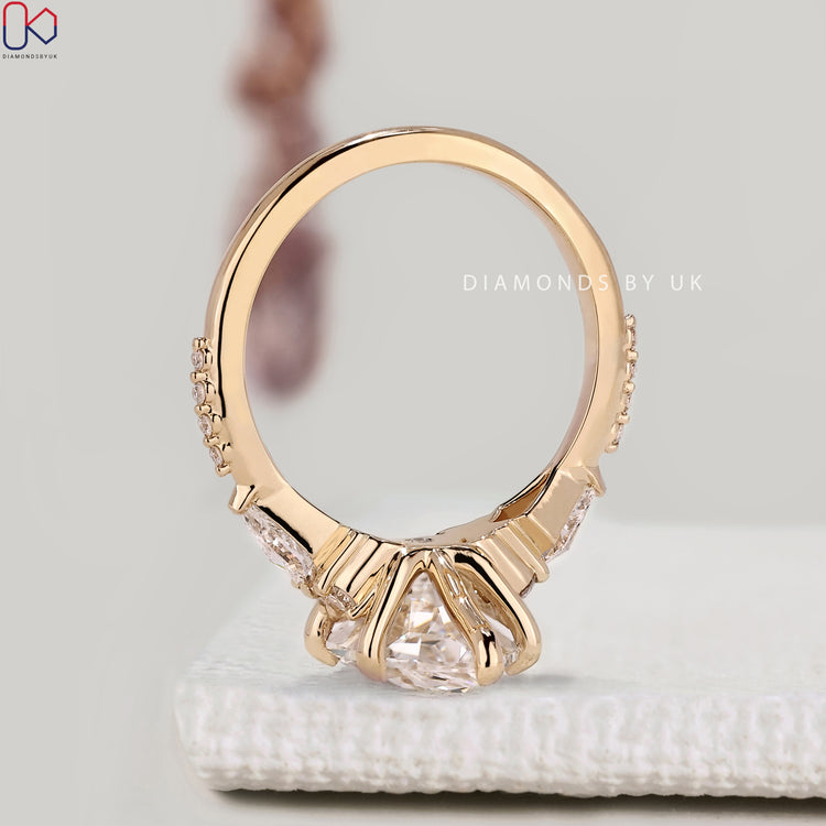 IGI certified Dutch marquise diamond ring with pavé style.  
