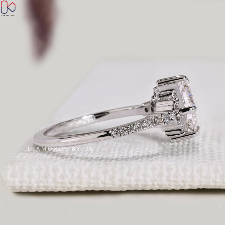 Lab grown princess diamond ring with claw prong setting.
