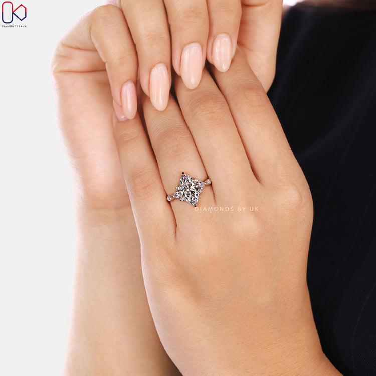 Diamondsbyuk marquise ring with pear diamond side stones.
