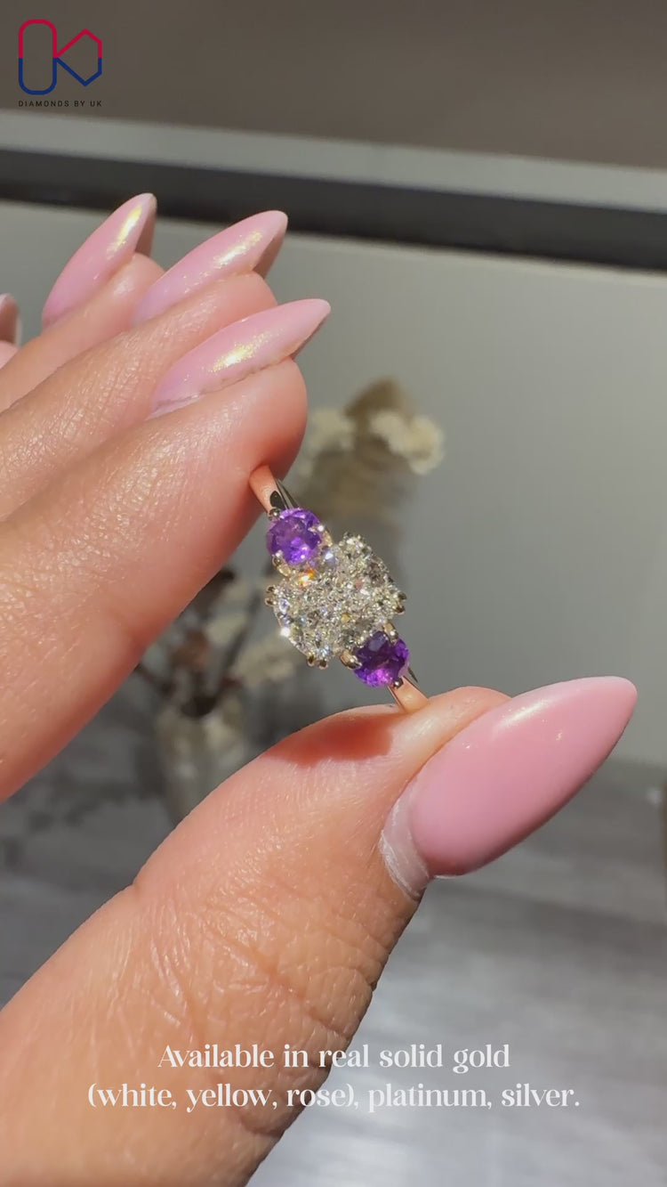 Handmade yellow gold three stone diamond ring.
