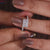 Princess cut band crafted for elegance and charm.
