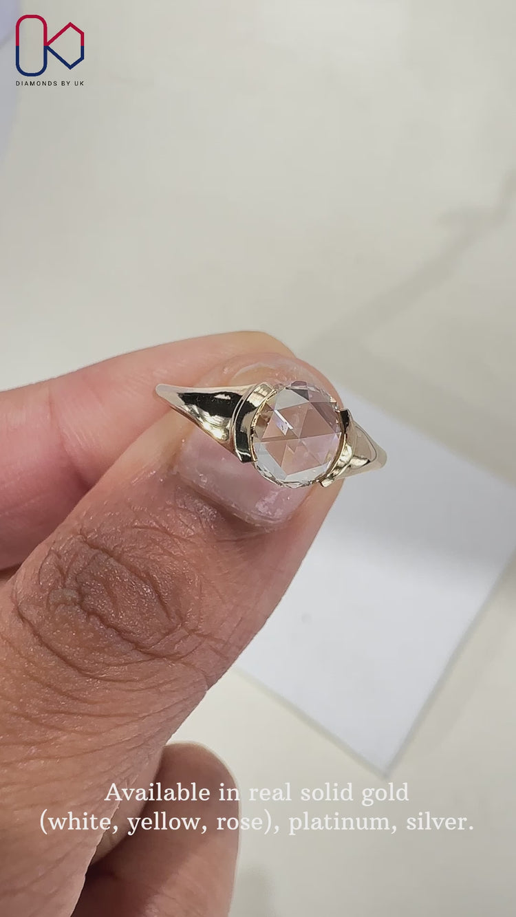 Round rose cut diamond ring set in a beautiful half bezel design.
