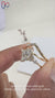Lab grown diamond engagement ring with six claw prongs.