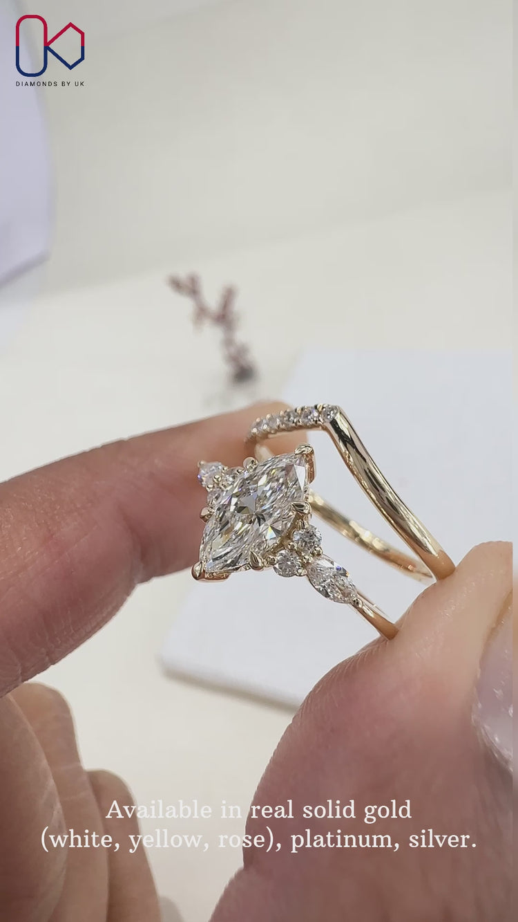 Lab grown diamond engagement ring with six claw prongs.