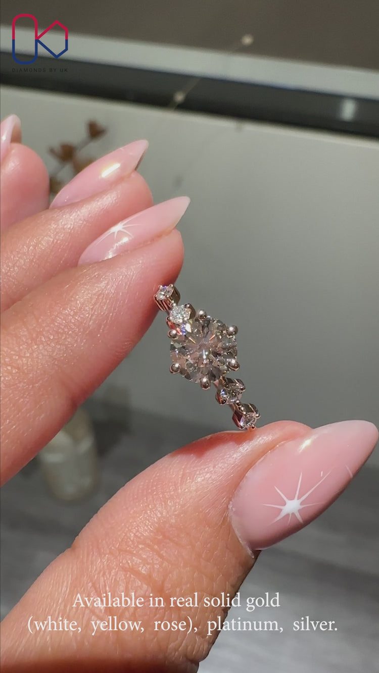 Five stone diamond ring in a classic 6 prong setting.
