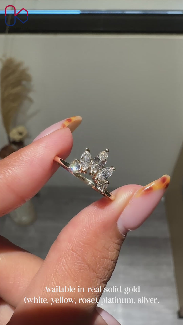 Marquise diamond band with round wedding band.
