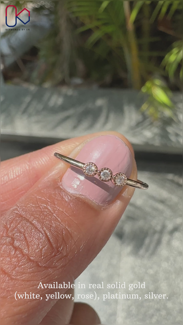 Lab grown round diamond band with milgrain detail.
