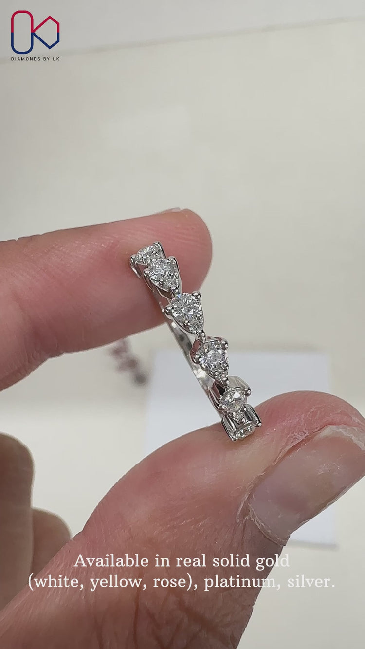 Round diamond wedding band showcasing timeless brilliance and classic design.