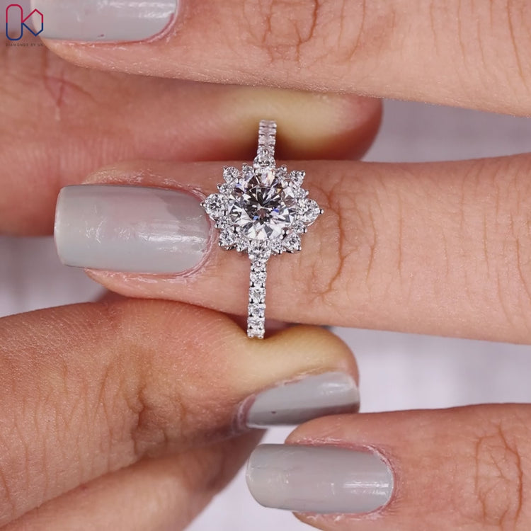 Round diamond engagement ring with pave setting for extra shine.
