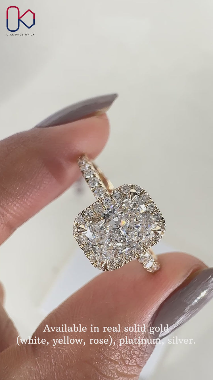 Pave diamond ring and four claw prong.
