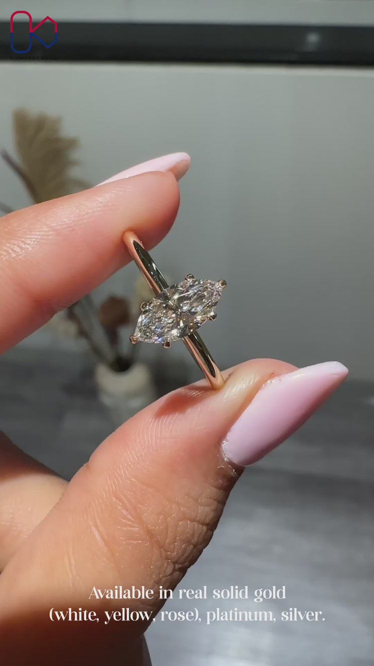 Marquise cut ring with classic solitaire design.