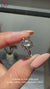 Round engagement ring with bridge accent style.