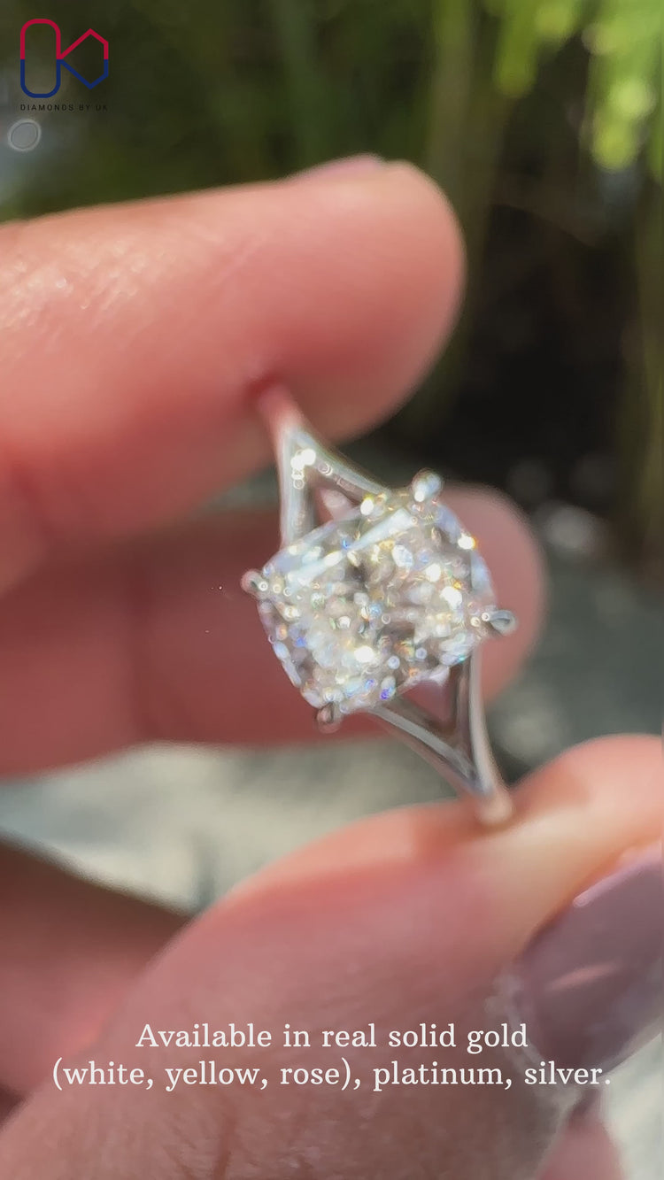 Cushion cut solitaire ring with secure claw setting.